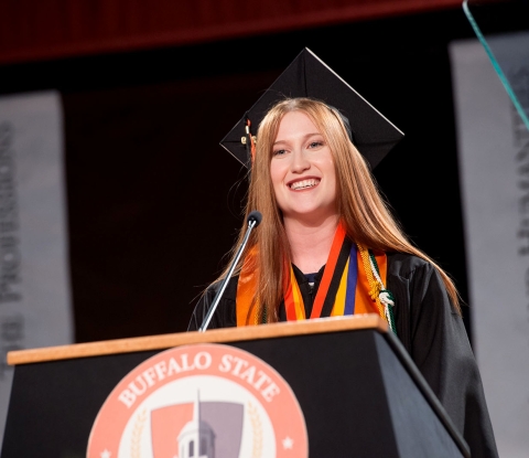 Commencement student at the podium